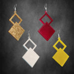 Pair of Times Square earrings made of acrylic or plastic with 925 silver hooks, unique square design.